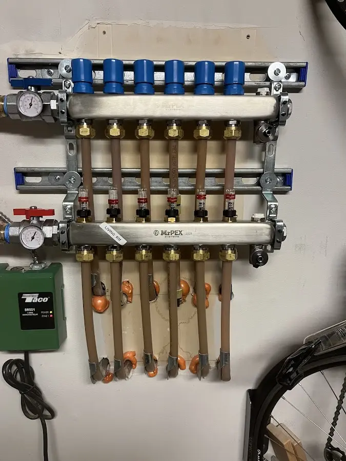 Plumber performing Water Heater Repair at a residential property in Moore